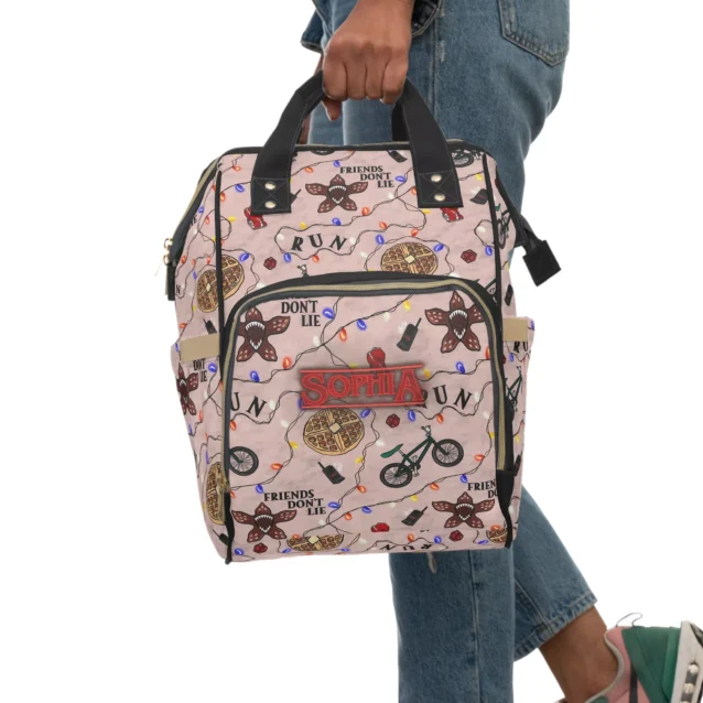 Comparison of large 15 inch custom bag versus small mini backpack.