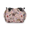 Water resistant nylon diaper bag surface repelling liquid spill.