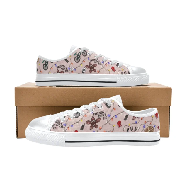 Side profile of Stranger Things Hellfire Club boys shoes with D&D dice and flame graphics.