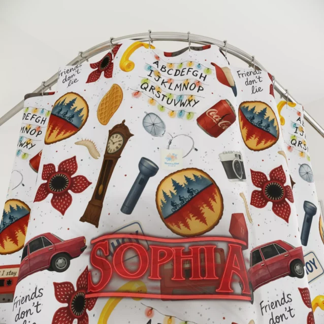 "Joyce Byers alphabet wall with Christmas lights pattern Stranger Things inspired bathroom accessory."