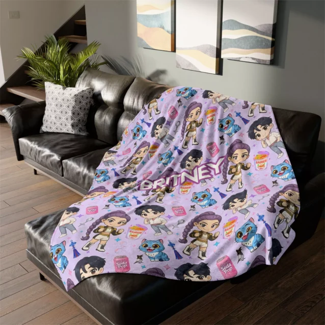 Kpop Demon Hunters Blanket featuring lead singer Rumi in her purple "Golden" era outfit.