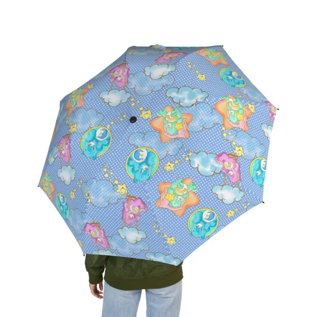 Child-safe push and pull easy-open mechanism on the Care Bears kids umbrella.