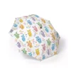 The soft foam handle of the Care Bears umbrella, held in one hand.