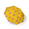 Water droplets beading off the 210T high-density fabric of the Pikachu umbrella.