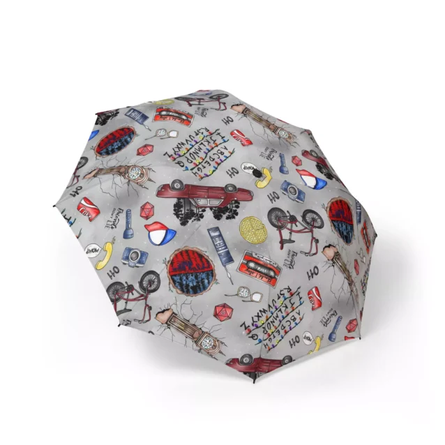 Stranger Things umbrella canopy open featuring the red Upside Down portal design.