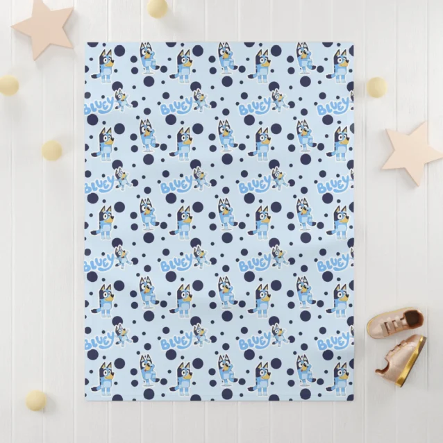 Complete matching baby travel set featuring a custom personalized Bluey diaper bag backpack paired with the 30x40 inch fleece baby blanket.