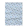 Personalized light blue Bluey nursery throw blanket showcasing custom name printing and durable double-needle stitching.