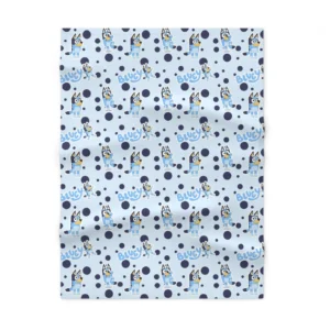 Personalized light blue Bluey nursery throw blanket showcasing custom name printing and durable double-needle stitching.