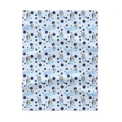 Personalized light blue Bluey nursery throw blanket showcasing custom name printing and durable double-needle stitching.