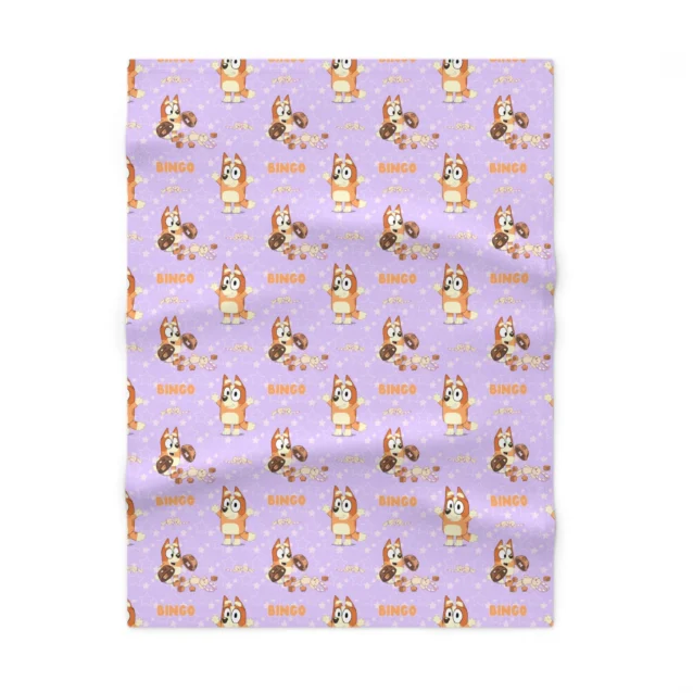 Soft pink personalized Bluey and Bingo nursery blanket showcasing character graphics printed on plush 100% polyester fleece.