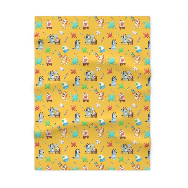 Vibrant orange personalized Bluey baby blanket displaying colorful Chilli graphics and fluffy microfiber construction.