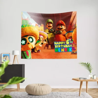 Colorful Super Mario Galaxy party decoration hanging on a wall.