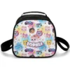 Front display layout of the matching Gabby's Dollhouse insulated thermal lunch bag for school snacks, featuring a secure zipper track and sturdy carrying handle.