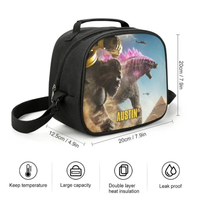 The Godzilla lunch box unzipped, showing the food-safe aluminium foil lining that keeps school lunches fresh.