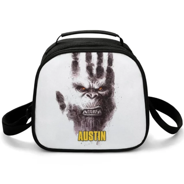 Custom personalized King Kong vs Godzilla insulated thermal lunch box for school, showcasing epic monster battle graphics and a secure zippered food compartment.