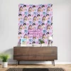 Chibi style Kpop idol party tapestry in pastel purple on a living room wall.