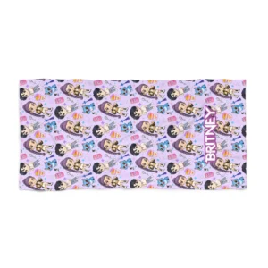 Personalized Kpop beach towel laid flat on white beach sand.
