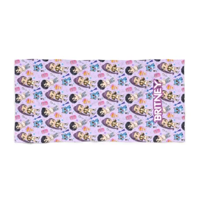 Personalized Kpop beach towel laid flat on white beach sand.