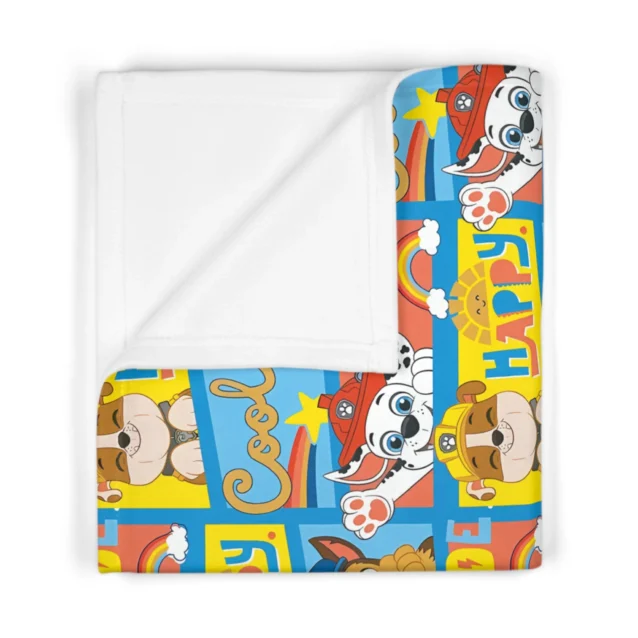 Vibrant personalized Paw Patrol rainbow paws toddler blanket displaying colorful graphics and double-needle edge stitching.