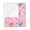 Soft pink personalized Paw Patrol nursery blanket showcasing Skye character graphics printed on plush 100% polyester fleece.