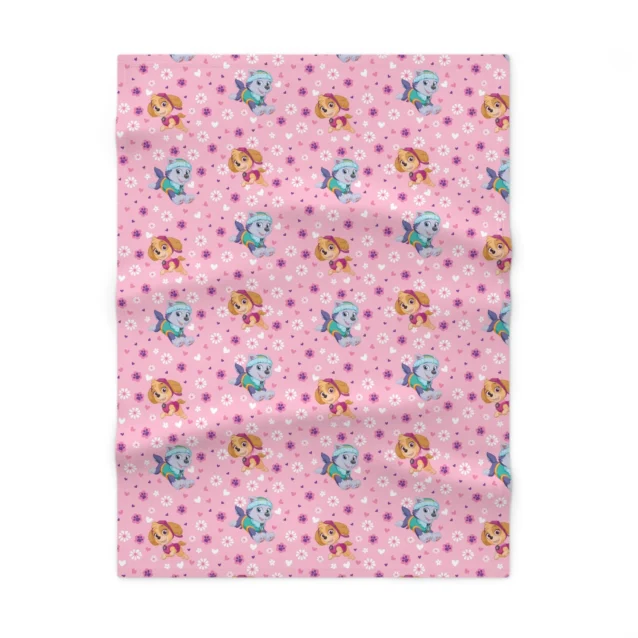 Soft pink personalized Paw Patrol nursery blanket showcasing Skye character graphics printed on plush 100% polyester fleece.