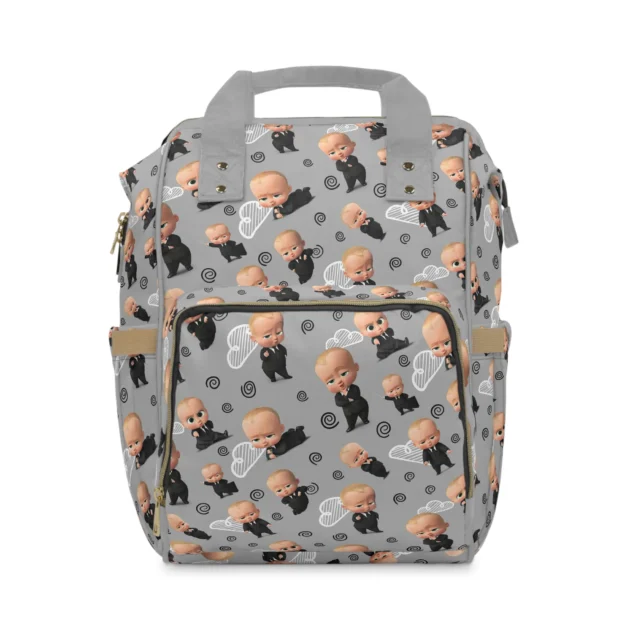 Grey Boss Baby diaper bag backpack with the Boss Baby in his suit tossed across the print, the baby's name on the pocket.
