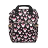 Black Minnie Mouse diaper bag with white Minnie silhouettes and pink bows.