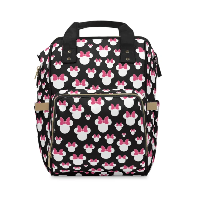 Black Minnie Mouse diaper bag with white Minnie silhouettes and pink bows.
