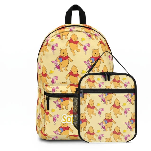 Pooh Bear backpack with its matching honey-yellow lunch bag propped in front.