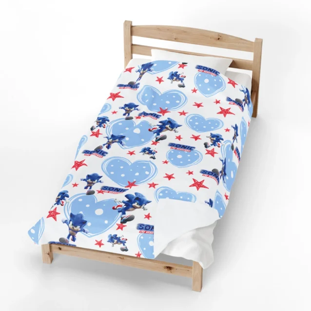 Sonic Blanket in the Blue Hearts and Stars design, made up in a bedroom