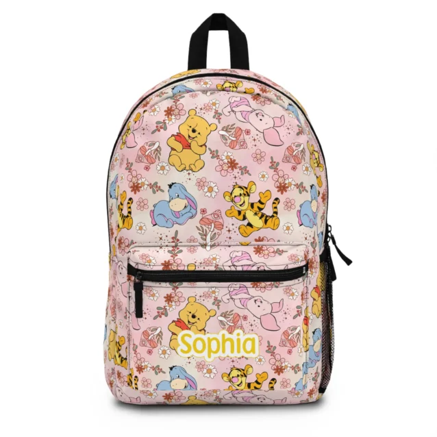 Pastel pink Tigger and friends backpack with Pooh, Eeyore and Tigger, printed with a custom name.