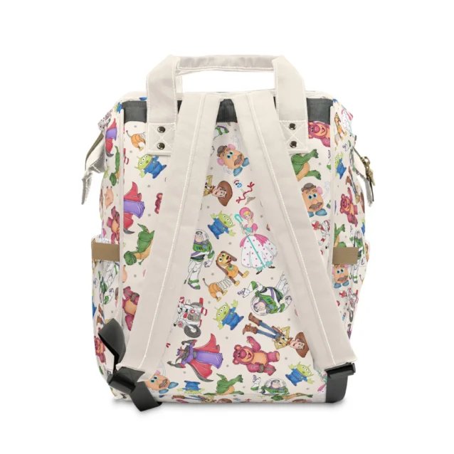 Back view of the cream Toy Story toy gang doodles diaper bag.